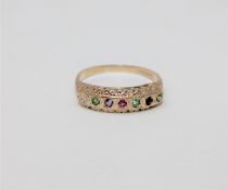 A 9ct gold 'Dearest' ring, set with a diamond, emerald, amethyst, ruby, emerald,