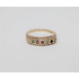 A 9ct gold 'Dearest' ring, set with a diamond, emerald, amethyst, ruby, emerald,