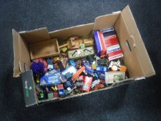 A box of mid 20th century and later play worn die cast vehicles, wooden tractor,