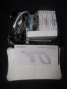 A Nintendo Wii games console with controller, leads,