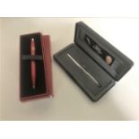 A boxed Fisher Space Pen and a boxed Ferrari ball-point pen (2)