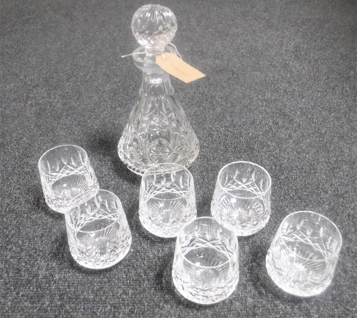 A Waterford Crystal decanter and six glasses