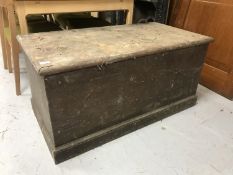 An antique pine blanket chest