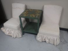 A painted occasional table and a pair of pink upholstered bedroom chairs