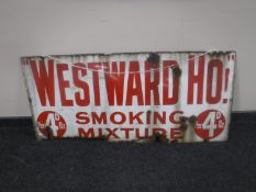 An early 20th century enamelled advertising sign "Westerward Ho! Smoking Mixture"