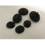 A bag of six Whitby jet brooches