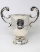 An Edwardian silver twin-handled trophy cup, Walker & Hall, Sheffield 1907, engraved 'Challenge Cup,