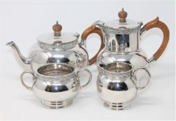 A Lindisfarne silver four-piece tea service, Reid & Sons, London 1962 and 1963,