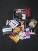 A large collection of Elvis Presley memorabilia including books, CD box sets, framed photograph,