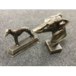 Two cast iron greyhound figures