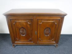 An Edwardian mahogany double door sideboard CONDITION REPORT: 122cm by 47cm deep by