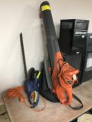 A Flymo garden vacuum and a Challenge electric hedge trimmer