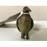 A miniature bronze penguin,