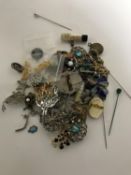 Two boxes of costume jewellery - brooches, necklaces, cross,