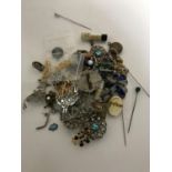 Two boxes of costume jewellery - brooches, necklaces, cross,