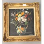 John Falconar Slater : Still life with mixed flowers in a ceramic jug, oil on panel, signed,