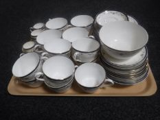 A tray of forty-three pieces of antique Heathcote tea china
