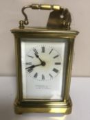A brass cased French carriage clock by Hamilton & Company of Calcutta