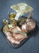 A tray of antique brass and copper ware including brass trivet, ice bucket, candlesticks,
