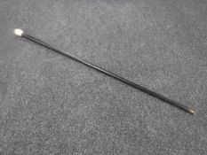 An antique Masonic walking cane with bone pommel