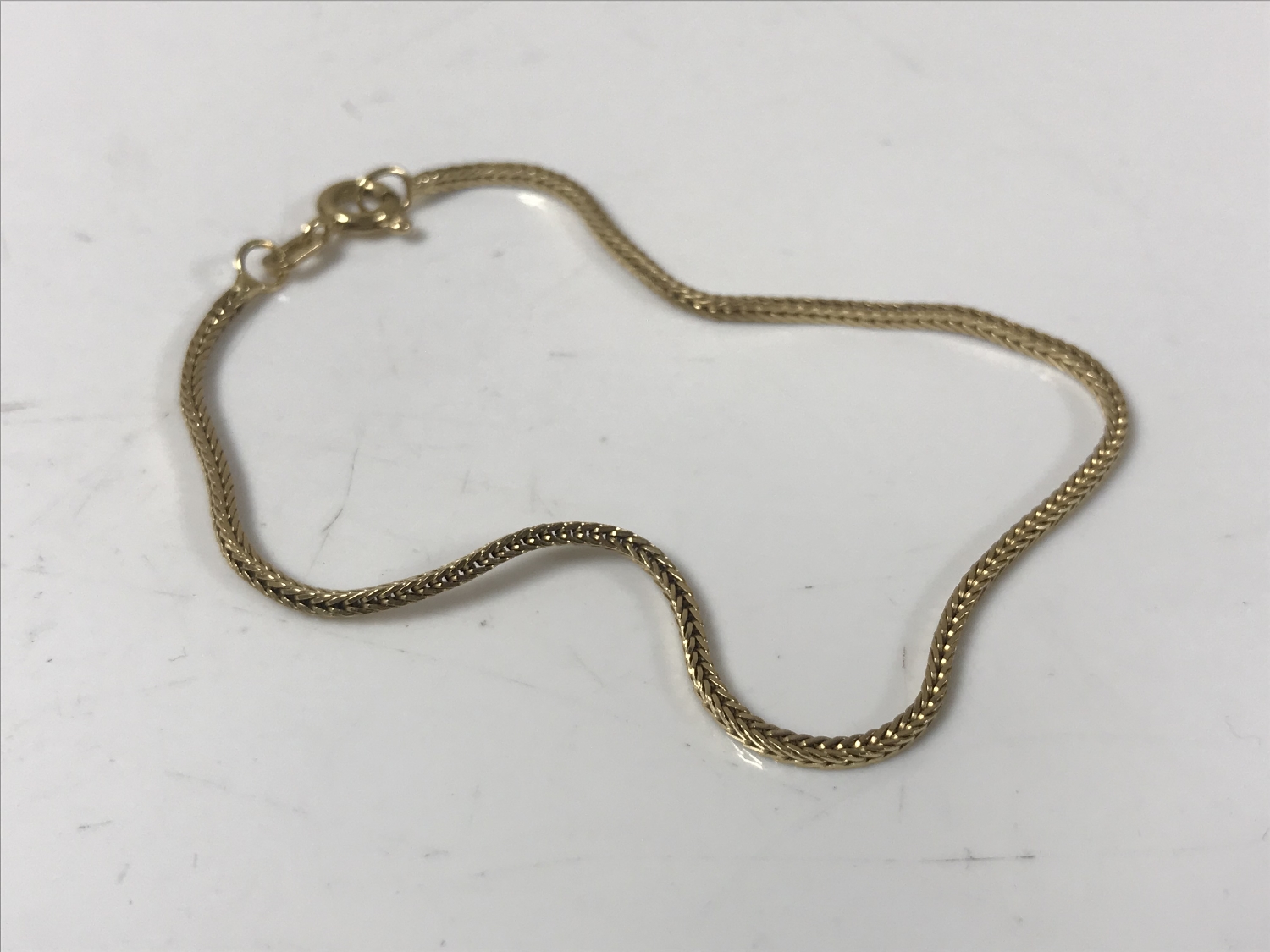 An 18ct gold bracelet CONDITION REPORT: 2.