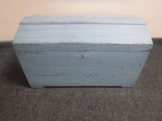 An early 20th century painted pine dome topped trunk
