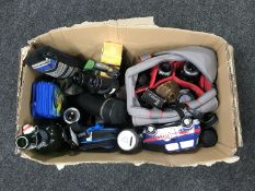 A box of assorted cameras and camera equipment, binoculars,