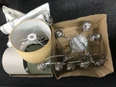 A box of crystal light fitting and three way metal and glass candle holder,