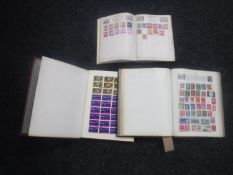 Three 20th century stamp albums containing stamps of the world