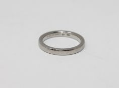 A platinum band ring stamped '950', size I CONDITION REPORT: 4.