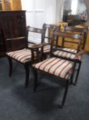 Four inlaid mahogany Regency style dining chairs