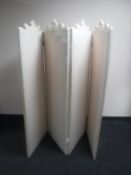 A painted and fabric upholstered four fold room divider