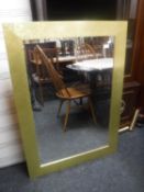 A gilt framed mirror and a 4'6 headboard