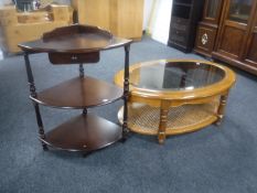 An oval Colonial style coffee table and corner what not stand
