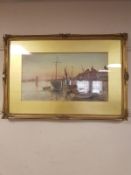 Fred Fitch : Fishing boats at low tide by a quay, watercolour, signed, 30 cm x 53 cm, framed.