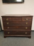 A George III mahogany chest of six drawers on bracket feet,