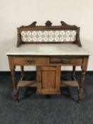 An Edwardian mahogany marble topped wash stand