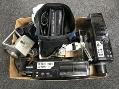 A box of assorted cameras, two TV projectors, multi media disk player,