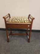 An Edwardian inlaid mahogany storage piano stool upholstered in a Ralph Lauren crushed velvet,