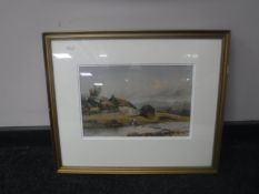 A gilt framed watercolour of lady washing at a stream, by E.W.