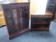 A set of inlaid mahogany open bookshelves fitted a drawer together with a mahogany effect double