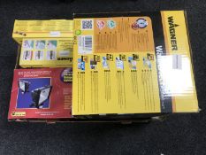 A box of Wagner wall paper stripper, paint kit, spray kit, halogen light,