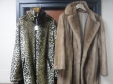 Two simulated fur coats