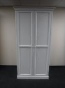 A contemporary white double door wardrobe