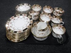 A tray of thirty pieces of antique Melba tea china
