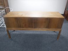 A mid 20th century four door sideboard