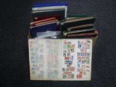 A box of 20th century stamp albums containing stamps of the world