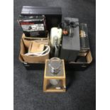 A box of leather briefcase, key safe, Sony cassette radio, Sony Walkman, hurricane lamp,