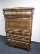 A late 19th century continental mahogany secretaire chest