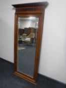 An antique mahogany hall mirror